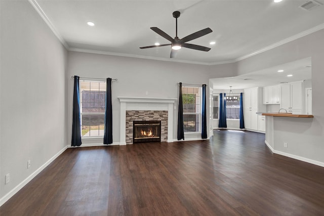 4909 Indio Ln, Sherman, TX 75092 - unfurnished living room featuring recessed lighting, dark wood finished floors, crown molding, ceiling fan, and a fireplace