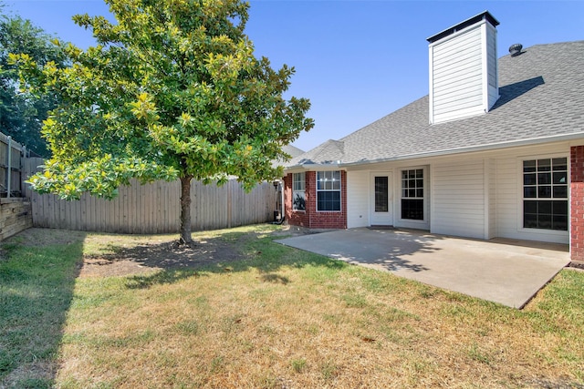 4909 Indio Ln, Sherman, TX 75092 - view of yard featuring a patio