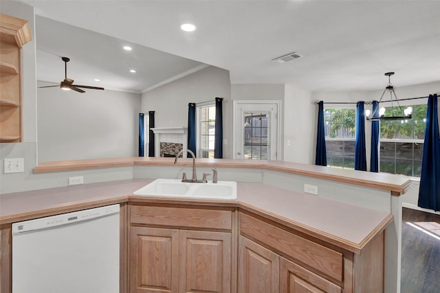 4909 Indio Ln, Sherman, TX 75092 - kitchen featuring white dishwasher, a ceiling fan, recessed lighting, wood finished floors, and light countertops