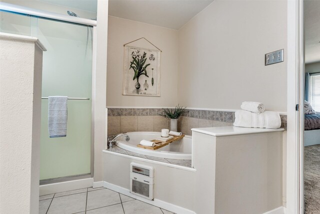 1105 Pyramid Dr, Garland, TX 75040 - ensuite bathroom with a garden tub, a shower stall, tile patterned flooring, and heating unit