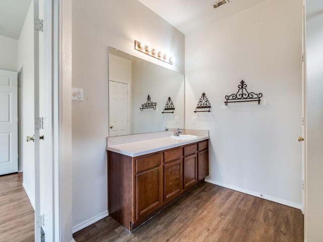 131 Freedom Trl, Forney, TX 75126 - bathroom featuring wood finished floors and vanity