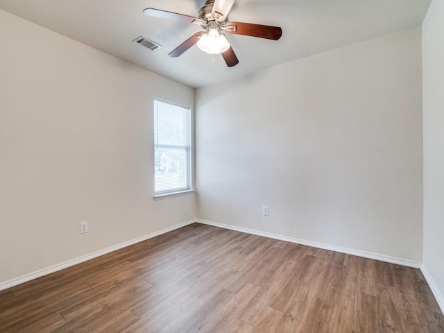 131 Freedom Trl, Forney, TX 75126 - spare room featuring wood finished floors and a ceiling fan