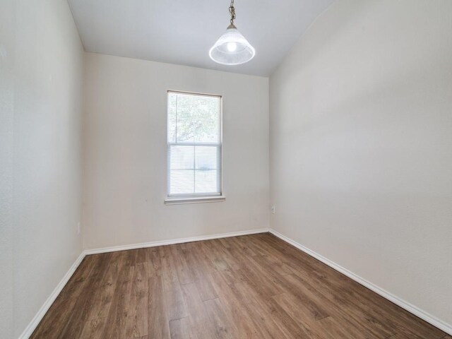 131 Freedom Trl, Forney, TX 75126 - unfurnished room featuring wood finished floors and baseboards
