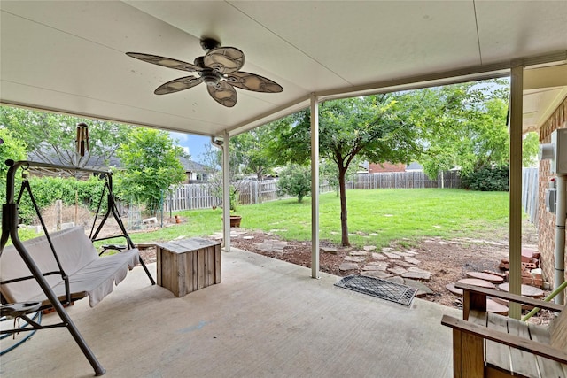 1645 Ashbourne Dr, Rockwall, TX 75087 - fenced backyard featuring ceiling fan and a patio