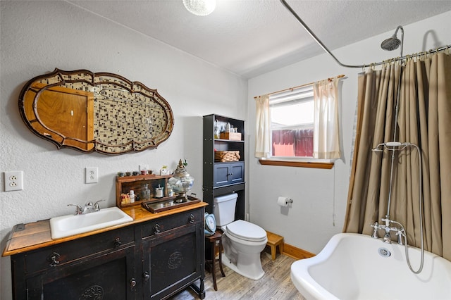 1243 Vz County Road 1903, Fruitvale, TX 75127 - bathroom featuring wood finished floors, a bath, vanity, and curtained shower