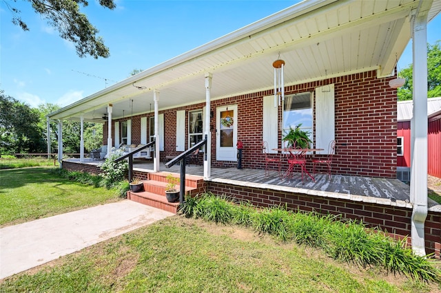 1243 Vz County Road 1903, Fruitvale, TX 75127 - view of front of home with a porch, a front lawn, and brick siding
