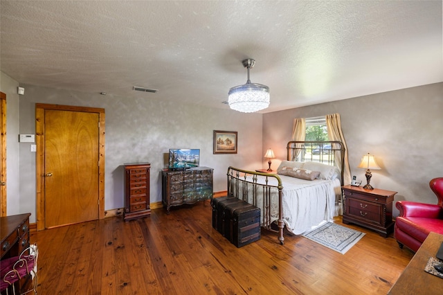 1243 Vz County Road 1903, Fruitvale, TX 75127 - bedroom featuring hardwood / wood-style floors and a textured ceiling