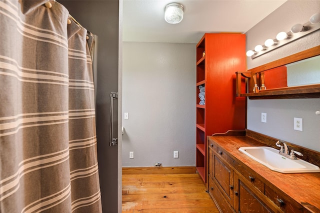1243 Vz County Road 1903, Fruitvale, TX 75127 - full bath with hardwood / wood-style floors, vanity, and curtained shower