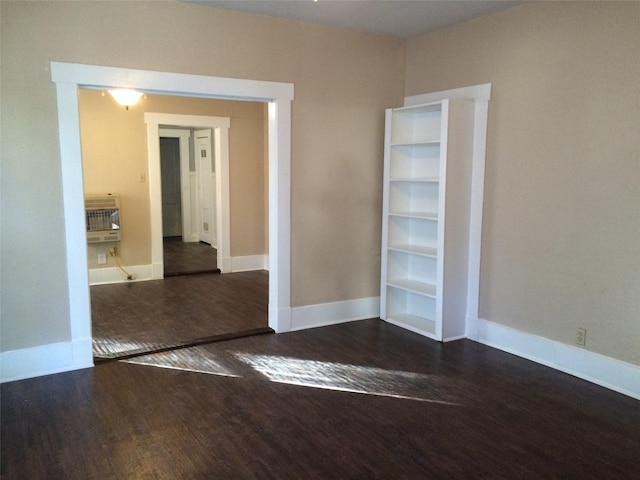 111 N Winnetka Ave, Dallas, TX 75208 - empty room featuring heating unit and wood finished floors
