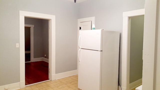 111 N Winnetka Ave, Dallas, TX 75208 - kitchen with freestanding refrigerator and baseboards