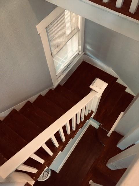111 N Winnetka Ave, Dallas, TX 75208 - stairway with wood finished floors