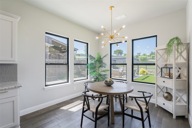 1253 Gray Fox Ln, Frisco, TX 75033 - dining room featuring plenty of natural light, a chandelier, and dark wood finished floors