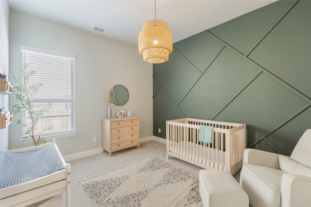 1253 Gray Fox Ln, Frisco, TX 75033 - bedroom with light colored carpet and a crib