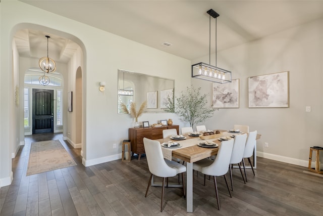 1253 Gray Fox Ln, Frisco, TX 75033 - dining room with arched walkways and dark wood finished floors