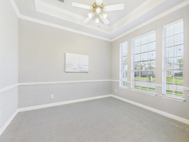 1197 Pleasant Oaks Dr, Lewisville, TX 75067 - unfurnished room featuring a raised ceiling, ceiling fan, carpet floors, and ornamental molding