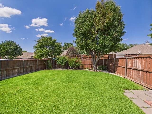 1197 Pleasant Oaks Dr, Lewisville, TX 75067 - view of fenced backyard