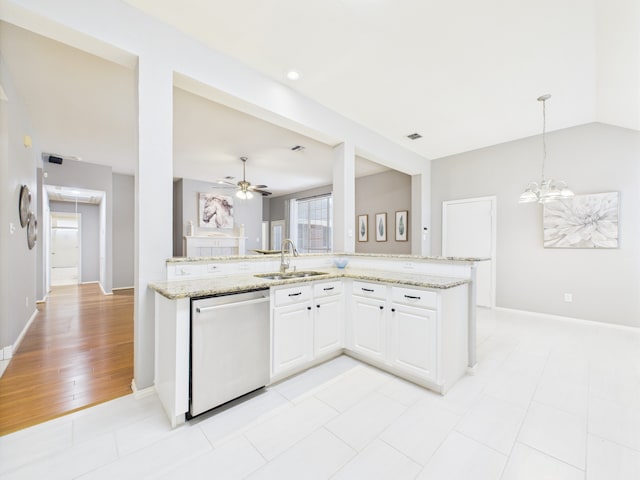 1197 Pleasant Oaks Dr, Lewisville, TX 75067 - kitchen with stainless steel dishwasher, light stone countertops, white cabinetry, decorative light fixtures, and a ceiling fan