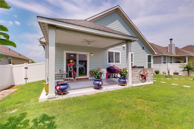 1712 Intervale Rd, Providence Village, TX 76227 - back of house with ceiling fan, a patio, a fenced backyard, and a shingled roof