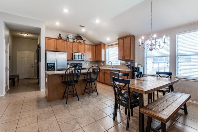 109 Niagara Falls Dr, Anna, TX 75409 - dining space with a chandelier, light tile patterned floors, lofted ceiling, and recessed lighting