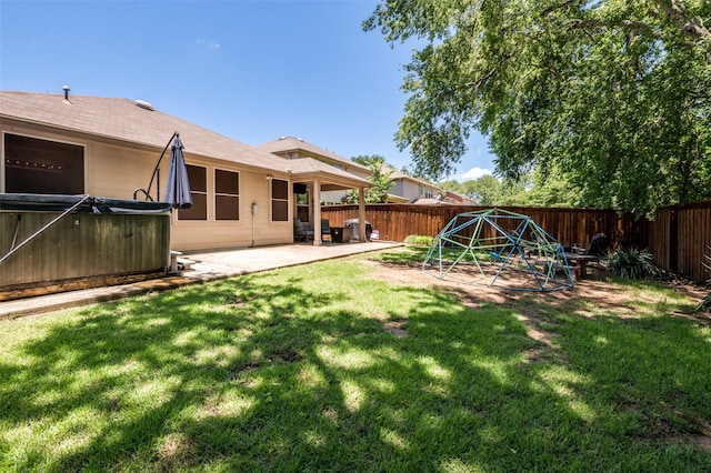 109 Niagara Falls Dr, Anna, TX 75409 - fenced backyard with a patio area and a hot tub