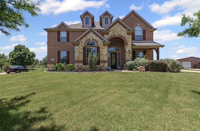 5024 Running Brook Dr, Joshua, TX 76058 - view of front of property featuring brick siding, a front lawn, and stone siding