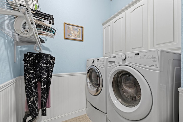 5024 Running Brook Dr, Joshua, TX 76058 - laundry area with washer and dryer, wainscoting, and cabinet space
