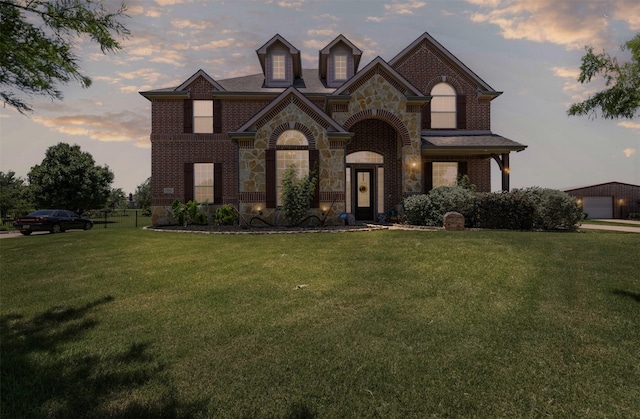 5024 Running Brook Dr, Joshua, TX 76058 - view of front of property with a lawn, brick siding, and stone siding