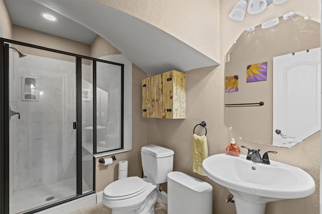 5024 Running Brook Dr, Joshua, TX 76058 - bathroom featuring a stall shower and a textured wall
