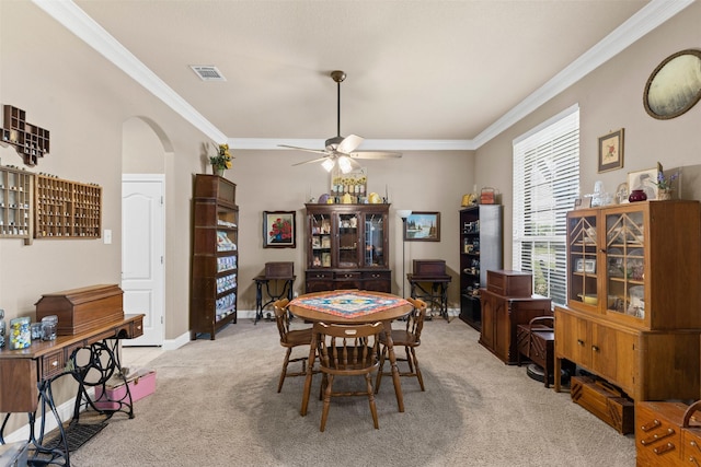 5024 Running Brook Dr, Joshua, TX 76058 - carpeted dining space with ornamental molding, arched walkways, and a ceiling fan