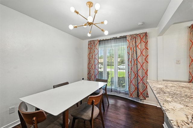 826 E Cherry St, Duncanville, TX 75116 - dining space featuring a chandelier and dark wood-type flooring