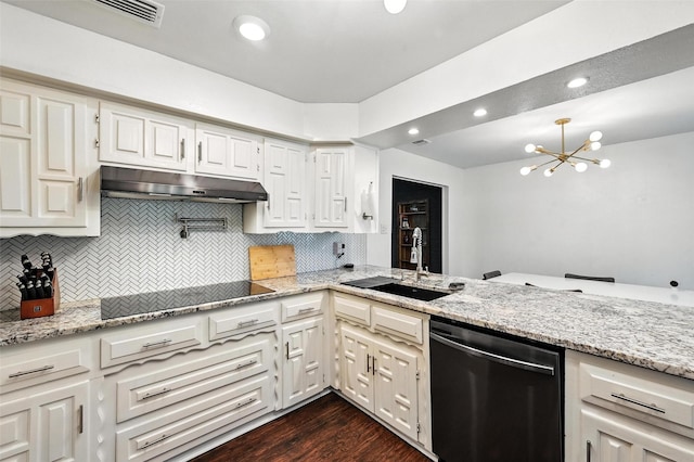 826 E Cherry St, Duncanville, TX 75116 - kitchen featuring dishwasher, under cabinet range hood, backsplash, black electric cooktop, and recessed lighting