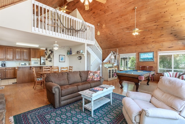 110 Waterview Ln, Pottsboro, TX 75076 - living room featuring a ceiling fan, high vaulted ceiling, billiards, light wood-style floors, and wooden walls