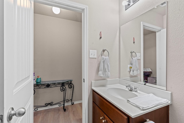 1420 Arabella Ave, Forney, TX 75126 - bathroom featuring vanity and wood finished floors