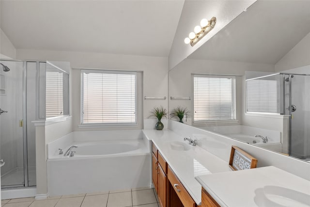 4611 Harvest Ln, Sachse, TX 75048 - full bathroom with lofted ceiling, double vanity, a garden tub, a shower stall, and tile patterned flooring