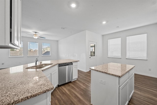 5025 Salinger Dr, Celina, TX 76227 - kitchen with stainless steel dishwasher, dark wood-type flooring, a center island, a ceiling fan, and recessed lighting