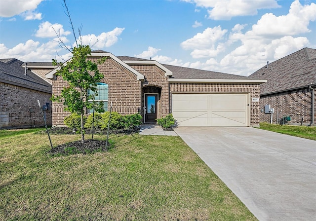 5025 Salinger Dr, Celina, TX 76227 - view of front of home with brick siding, an attached garage, concrete driveway, and a front yard