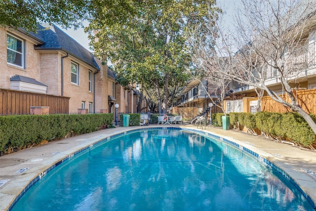 7814 Meadow Park Dr Unit 219, Dallas, TX 75230 - community pool with a residential view