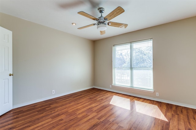 7814 Meadow Park Dr Unit 219, Dallas, TX 75230 - empty room featuring wood finished floors and ceiling fan