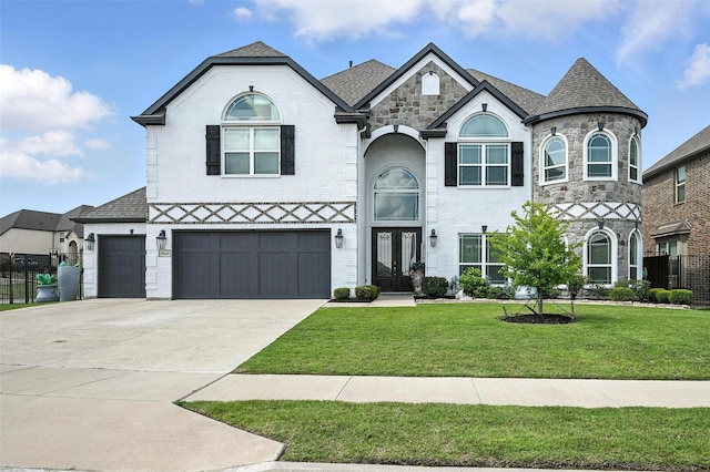 9840 El Colina Dr, Fort Worth, TX 76179 - french provincial home featuring french doors, a front yard, concrete driveway, an attached garage, and brick siding