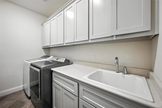 9840 El Colina Dr, Fort Worth, TX 76179 - laundry area with cabinet space and washer and dryer