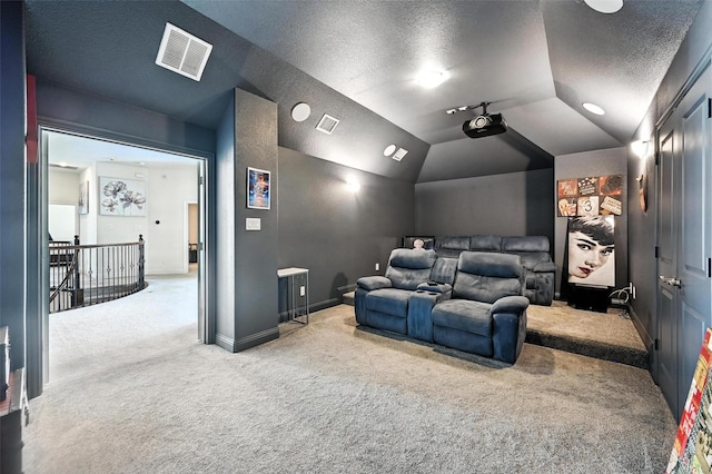 9840 El Colina Dr, Fort Worth, TX 76179 - carpeted home theater featuring a textured ceiling and vaulted ceiling