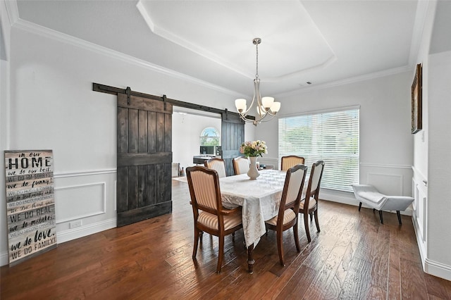 9840 El Colina Dr, Fort Worth, TX 76179 - dining area with a barn door, a tray ceiling, dark wood-style floors, a chandelier, and wainscoting