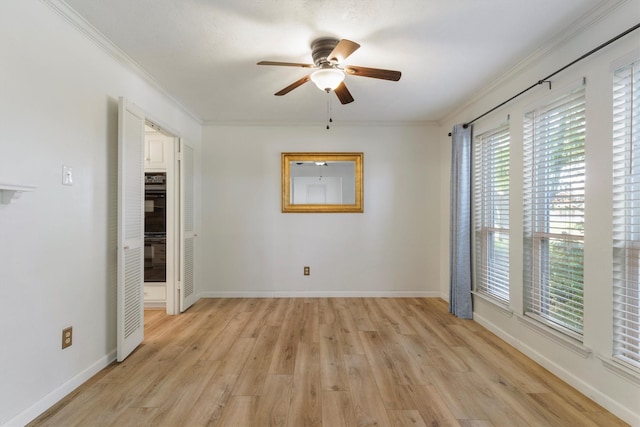 1810 Tulane Dr, Richardson, TX 75081 - unfurnished room featuring a ceiling fan, crown molding, and light wood-type flooring