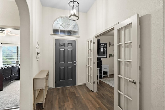 10200 Wildfowl Dr, Fort Worth, TX 76177 - entrance foyer with arched walkways, dark wood finished floors, and ceiling fan