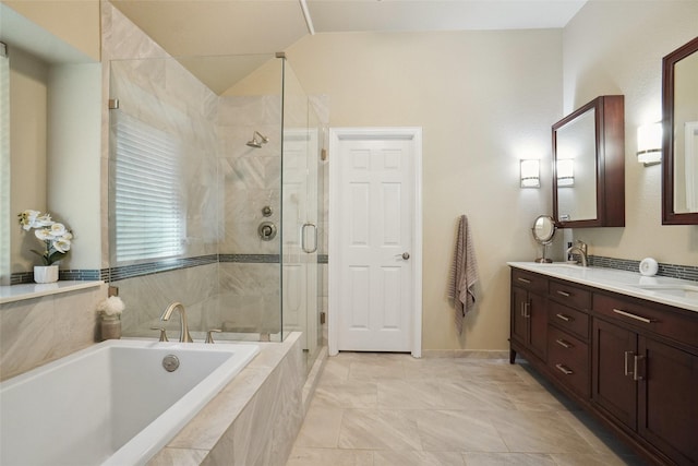 1660 Spinnaker Ln, Azle, TX 76020 - full bathroom featuring double vanity, a garden tub, a shower stall, and lofted ceiling