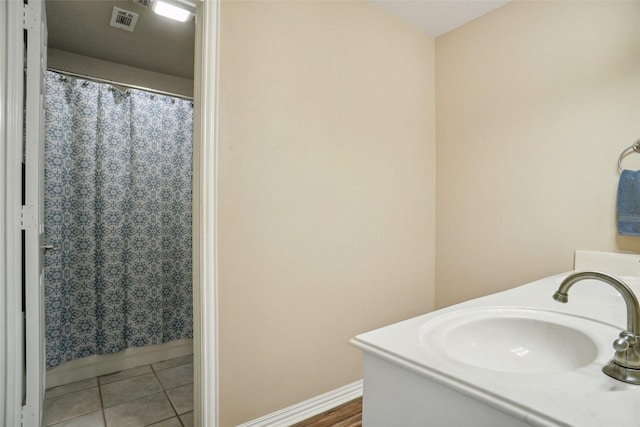 1660 Spinnaker Ln, Azle, TX 76020 - full bath featuring vanity, tile patterned floors, and a shower with curtain