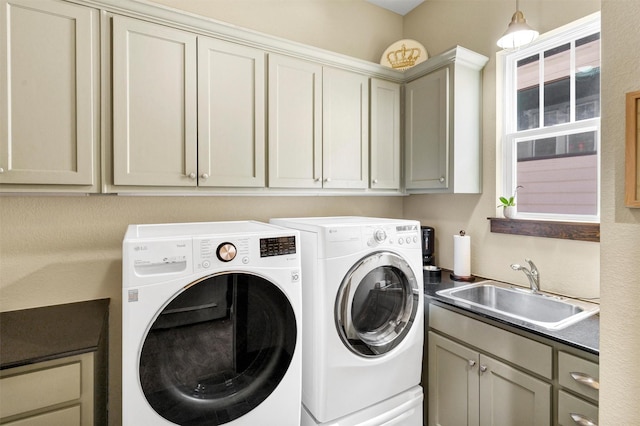 421 Dallas St, Argyle, TX 76226 - laundry area with washer and clothes dryer and cabinet space