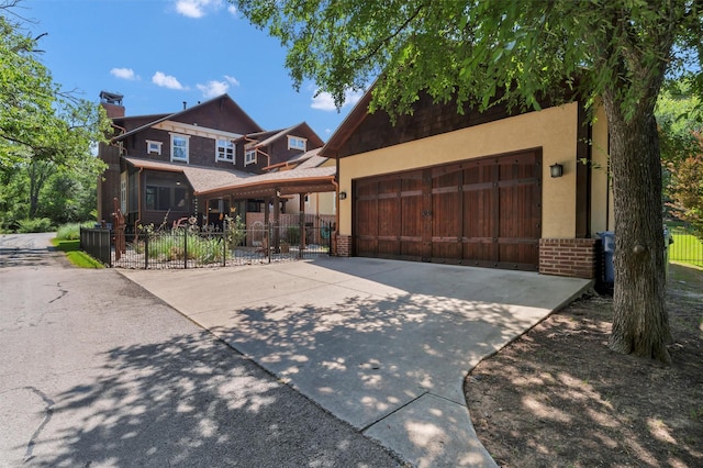 421 Dallas St, Argyle, TX 76226 - view of front of home with a garage, brick siding, driveway, and stucco siding