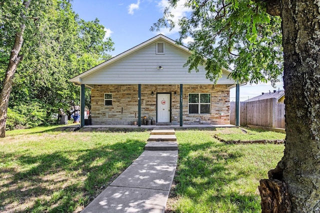 105 William St, Pottsboro, TX 75076 - view of front of house featuring a porch and stone siding