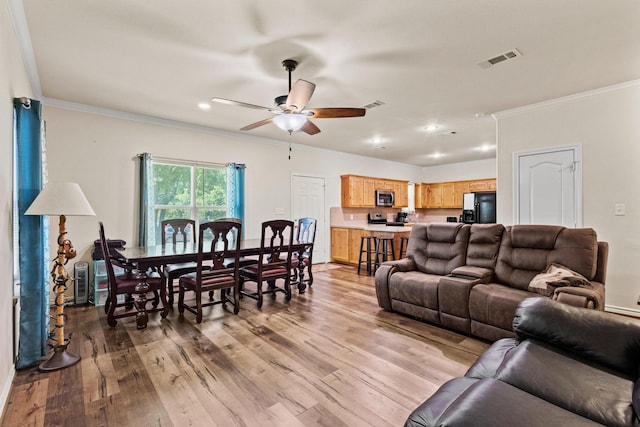 105 William St, Pottsboro, TX 75076 - living area with ornamental molding, a ceiling fan, light wood-type flooring, and recessed lighting